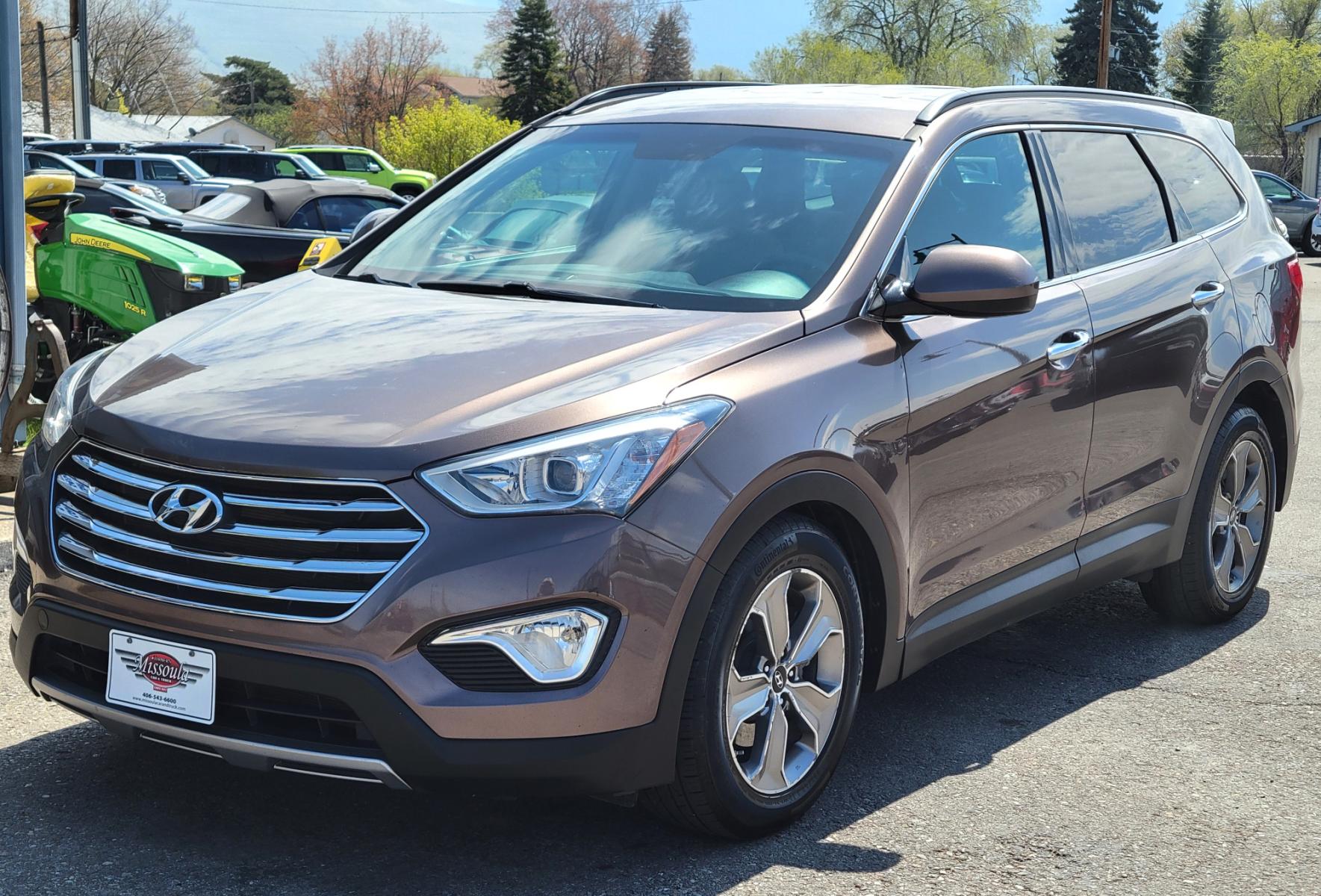 2015 Brown /Tan Hyundai Santa Fe GLS (KM8SMDHF7FU) with an 3.3L V6 engine, 6 Speed Auto transmission, located at 450 N Russell, Missoula, MT, 59801, (406) 543-6600, 46.874496, -114.017433 - Photo #1